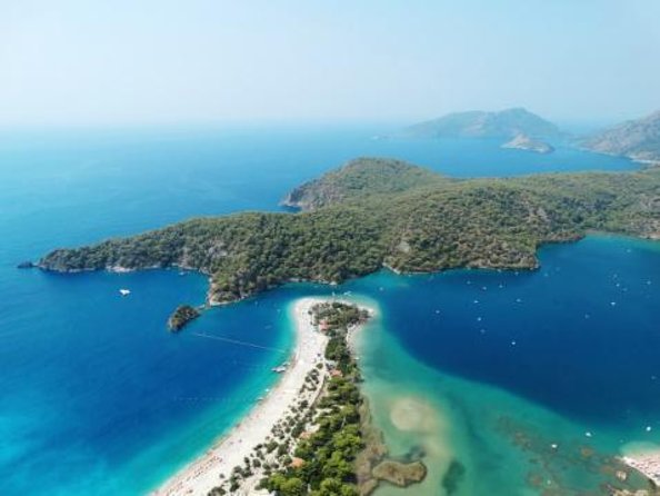 Tandem Paragliding Over The Blue Lagoon in Fethiye - Key Points