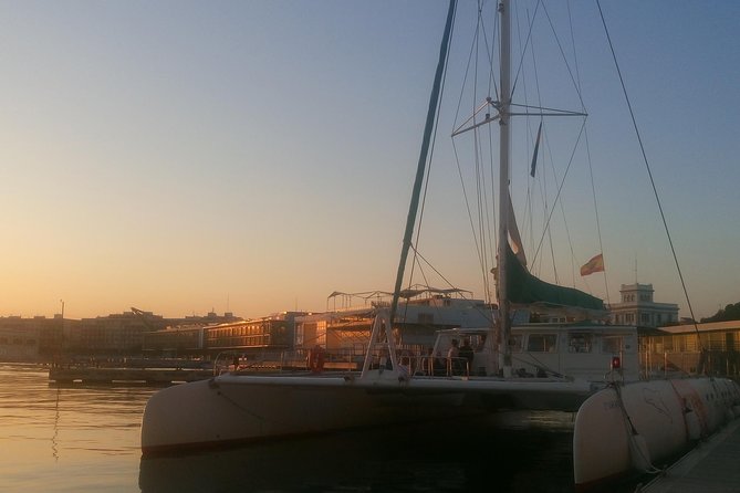 Valencia Sunset Cruise With Dinner at the Beach - Key Points