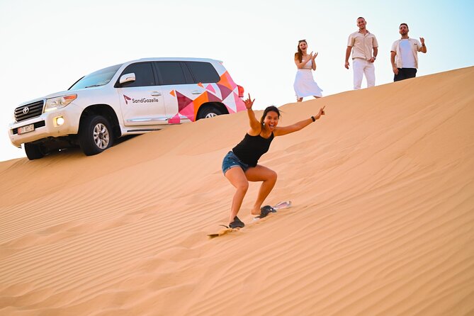 Abu Dhabi Morning Dune Bashing, Camel Ride & Sand Boarding