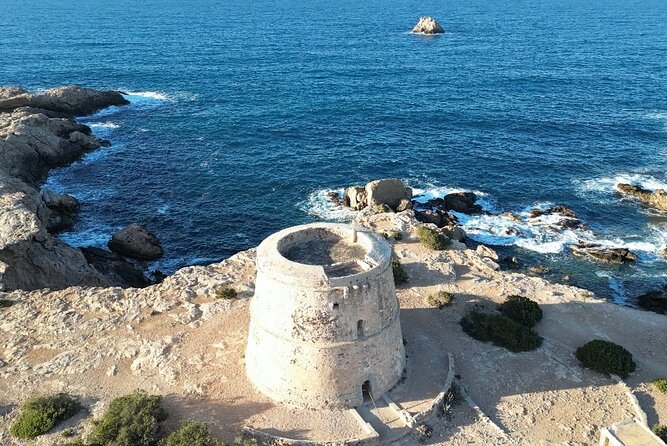 Ebike Tour to the Pirate Tower of Cala Bassa, Paella, and Sangria