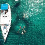 1 milos milos and polyaigos snorkeling and sup cruise Milos: Milos and Polyaigos Snorkeling and SUP Cruise