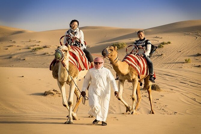 Morning Red Dunes by Quad Bike, Camel Ride and Sandboarding