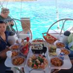 1 mykonos delos and rhenia cruise with swim and greek meal Mykonos: Delos and Rhenia Cruise With Swim and Greek Meal