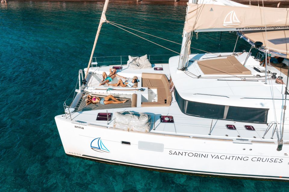 1 santorini catamaran sunset tour dinner drinks transfers Santorini Catamaran Sunset Tour: Dinner, Drinks & Transfers