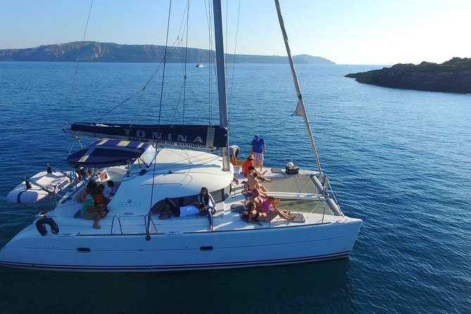 Santorini Full Day Catamaran Private Cruise Incl. Meal, Drinks & Free Transport