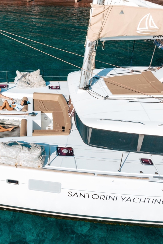 1 santorini luxury catamaran cruise lunch drinks transfers Santorini Luxury Catamaran Cruise: Lunch, Drinks, Transfers