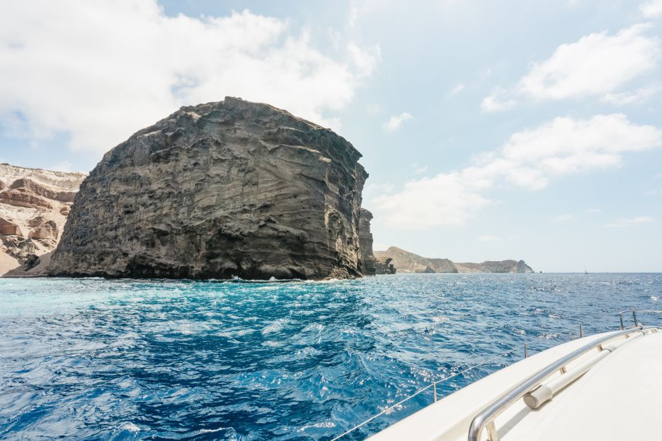 Santorini: Luxury Catamaran Day Trip With Meal and Open Bar - Guest Experience and Dining