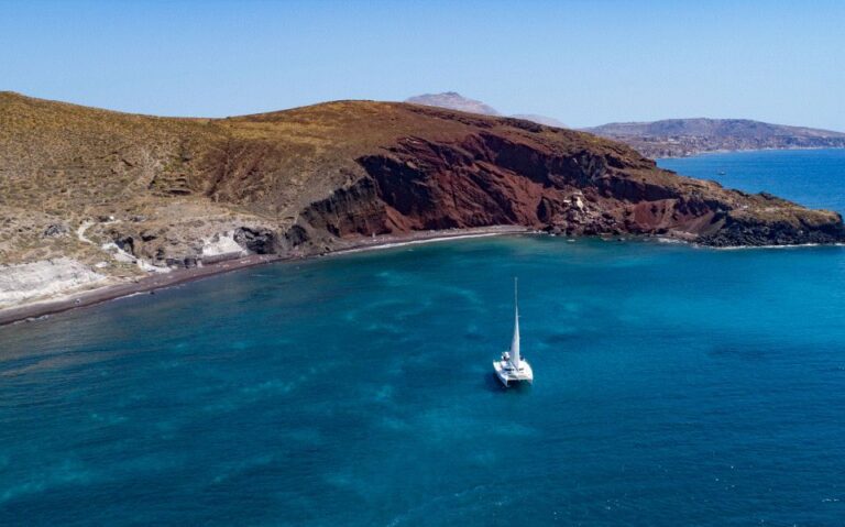 Santorini: Private Day Cruise With a BBQ Meal and Open Bar