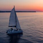1 santorini sunset cruise with swim stops dinner and drinks Santorini: Sunset Cruise With Swim Stops, Dinner, and Drinks