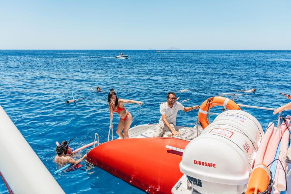 Santorini: Catamaran Tour With BBQ Dinner, Drinks, and Music - Inclusions and Exclusions