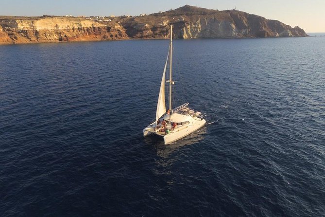 Santorini Full Day Catamaran Private Cruise Incl. Meal, Drinks & Free Transport - Private Cruise Experience