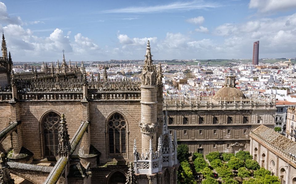From Malaga: Seville Day Trip Guide Commentary on the Bus - Review Summary
