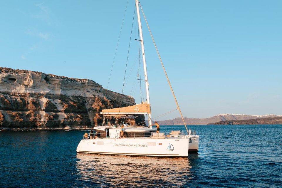 Santorini Catamaran Sunset Tour: Dinner, Drinks & Transfers - Itinerary Details