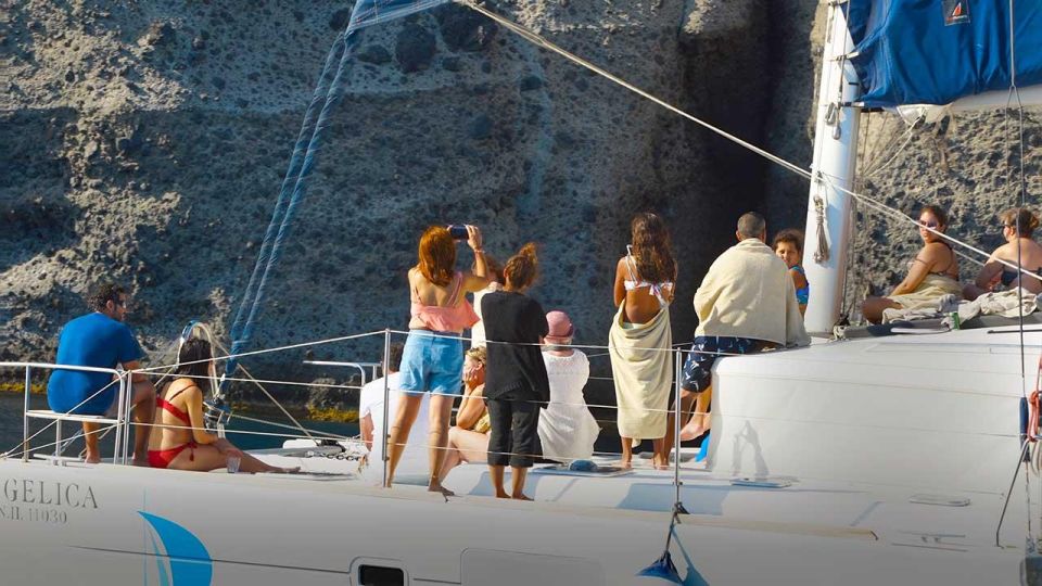 Santorini: Luxury Caldera Cruise With Full Greek Meal - Pickup and Activities