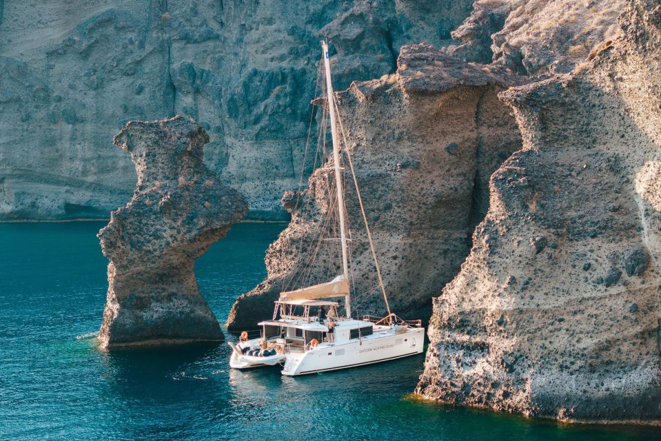 Santorini Luxury Catamaran Cruise: Lunch, Drinks, Transfers - Scenic Highlights and Swim Stops