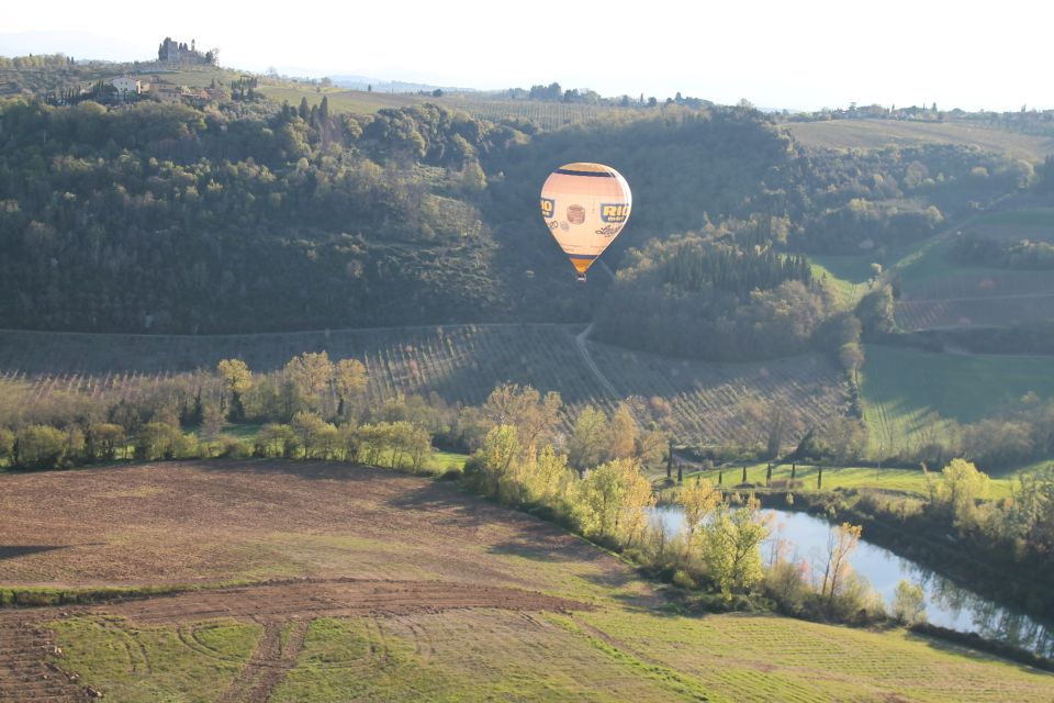 Siena: Balloon Flight Over Tuscany With a Glass of Wine - Flight Booking and Logistics