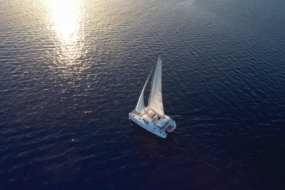 Santorini: Catamaran Cruise With Food and Open Bar - Booking Details