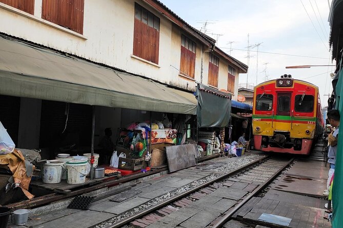 Mae Klong Railway, Amphawa Floating Market Day Tour From Bangkok - Common questions