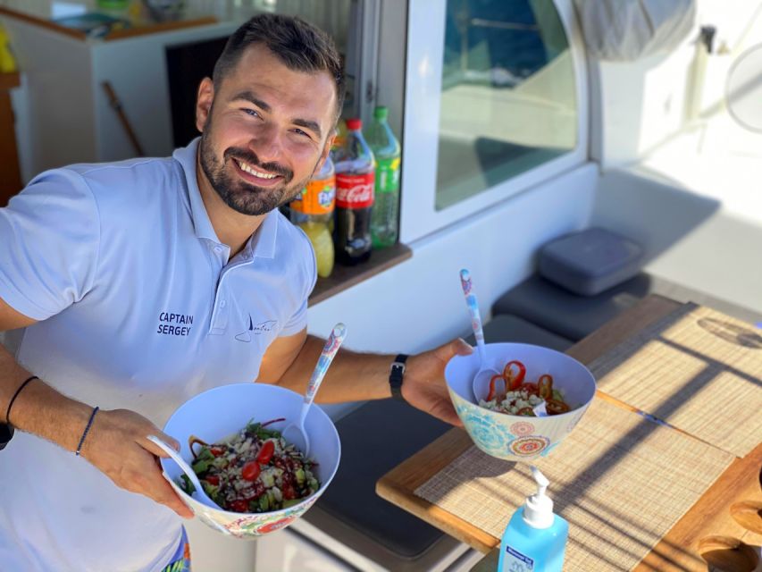 Hersonissos: Sunset Catamaran Trip With Finger Food & Drinks - Common questions
