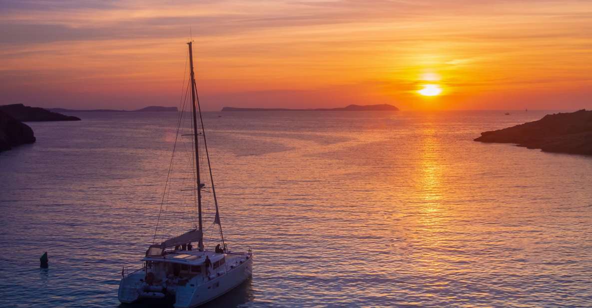 Santorini Catamaran Sunset Tour: Dinner, Drinks & Transfers - Key Points