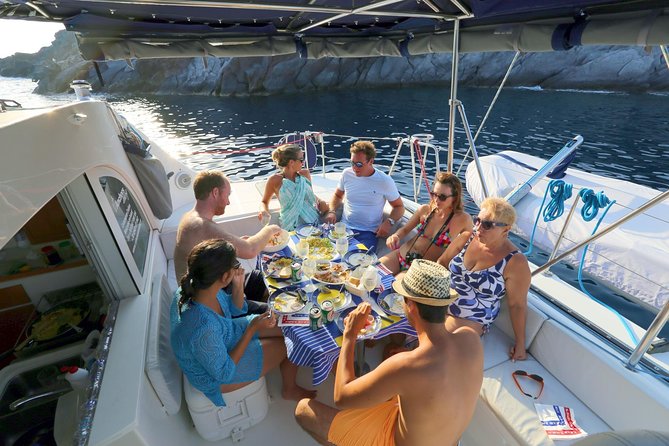 Santorini Full Day Catamaran Private Cruise Incl. Meal, Drinks & Free Transport - Key Points