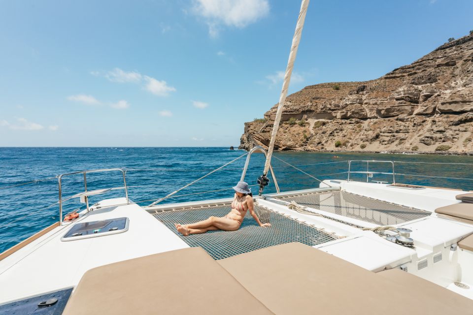 Santorini: Luxury Catamaran Day Trip With Meal and Open Bar - Key Points
