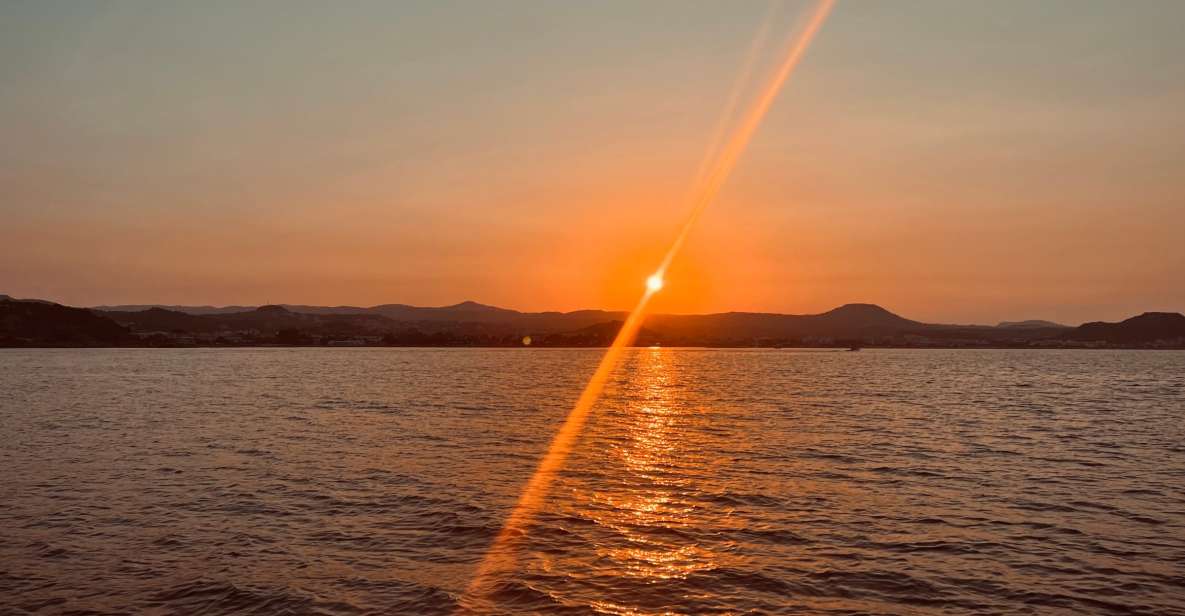 From Faliraki: Sunset Cruise With Unlimited Drinks - Duration and Inclusions