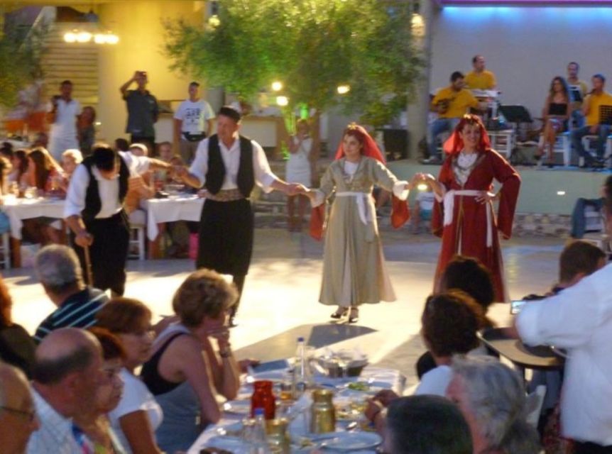 Kos: Tavern Dinner Experience With Greek Dancing and Wine - Dining Experience Highlights