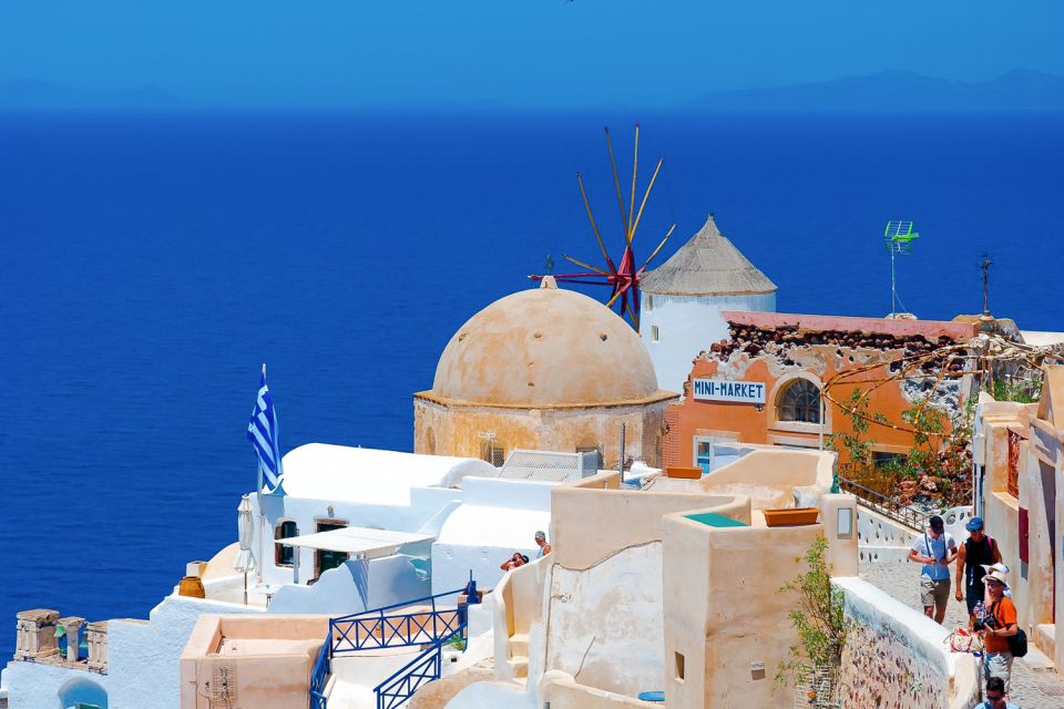 Santorini Island Bus Tour and Caldera Sunset Cruise - What to Bring