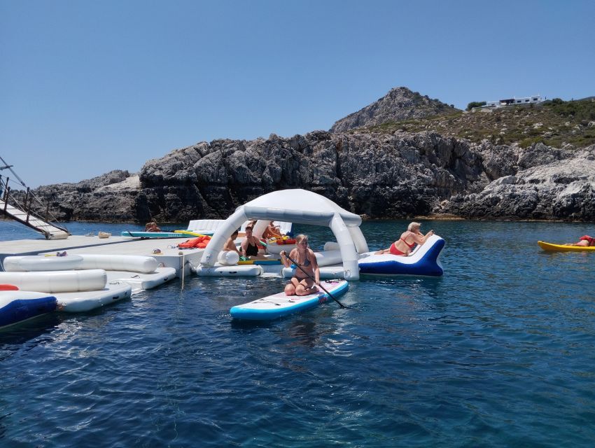 Rhodes: Boat Cruise With Food, Drinks, Sup, Kayak & Swimming - Description