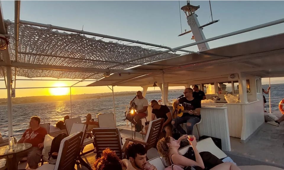 Rhodes: Sunset Cruise With Live Music, Wine & Greek Buffet - Booking Information