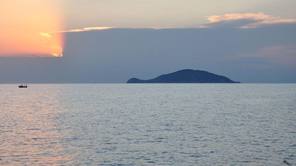 From Neos Marmaras: Sunset Sailing Tour to Coves & Islands - Experience Description