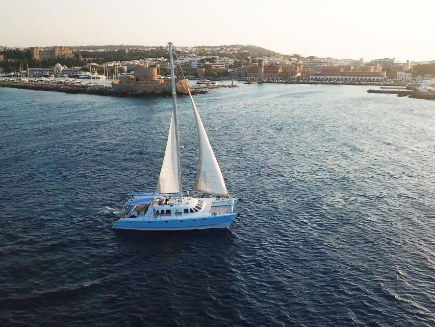 Rhodes: Catamaran Cruise With Snacks, Wine & Sunset Viewing - Common questions