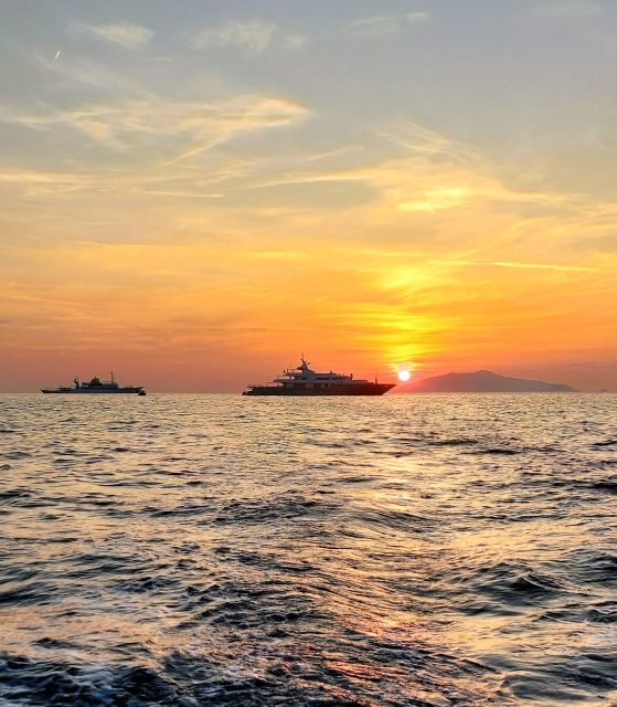 Tour of Capri by Classic Boat at Sunset - Language and Features